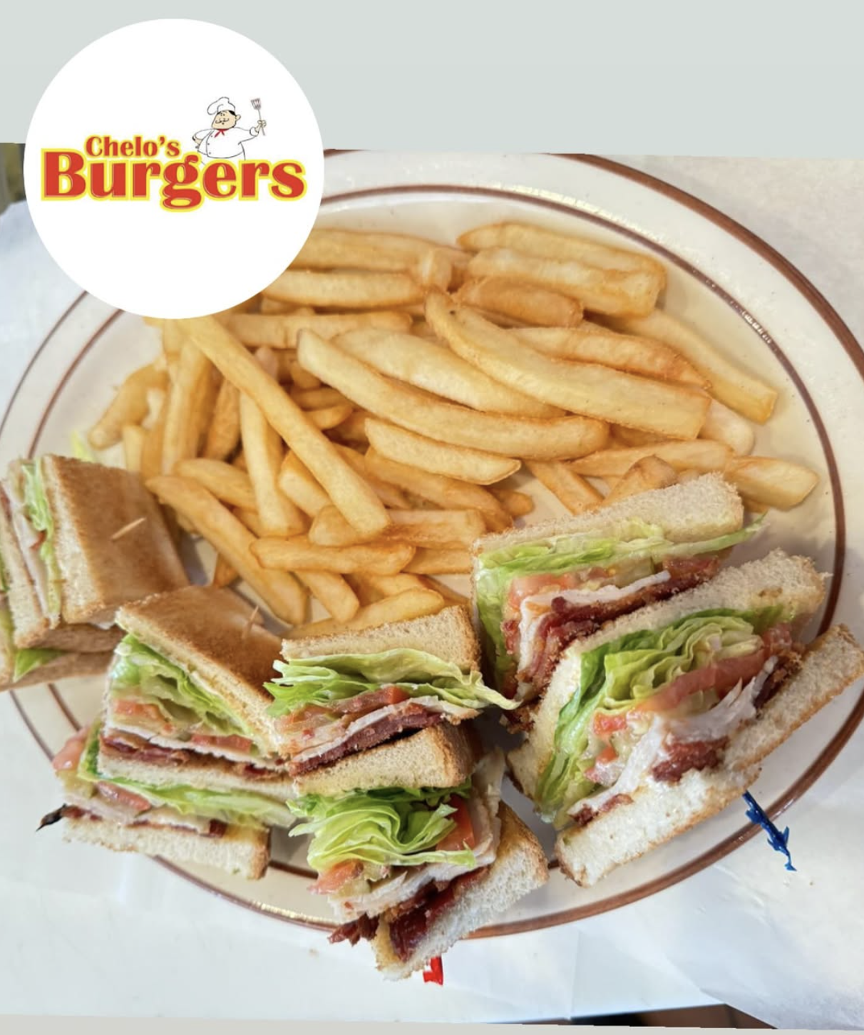 Club sandwich with fries